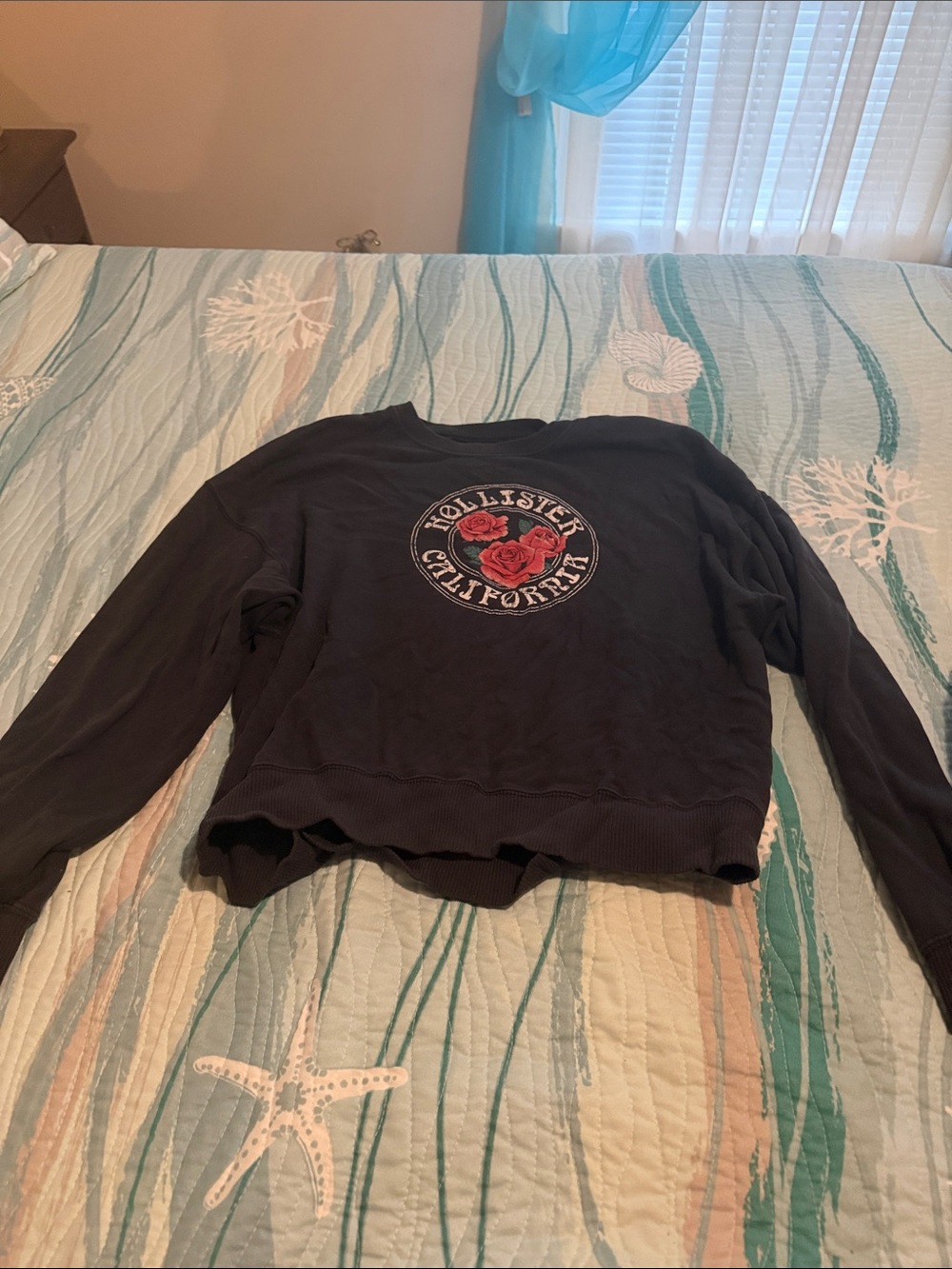 Hollister Black Crewneck Sweatshirt with Red Rose Patch